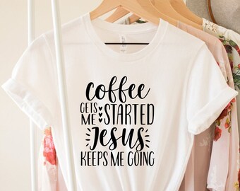 May include: White t-shirt with black text that reads "Coffee gets me started Jesus keeps me going".