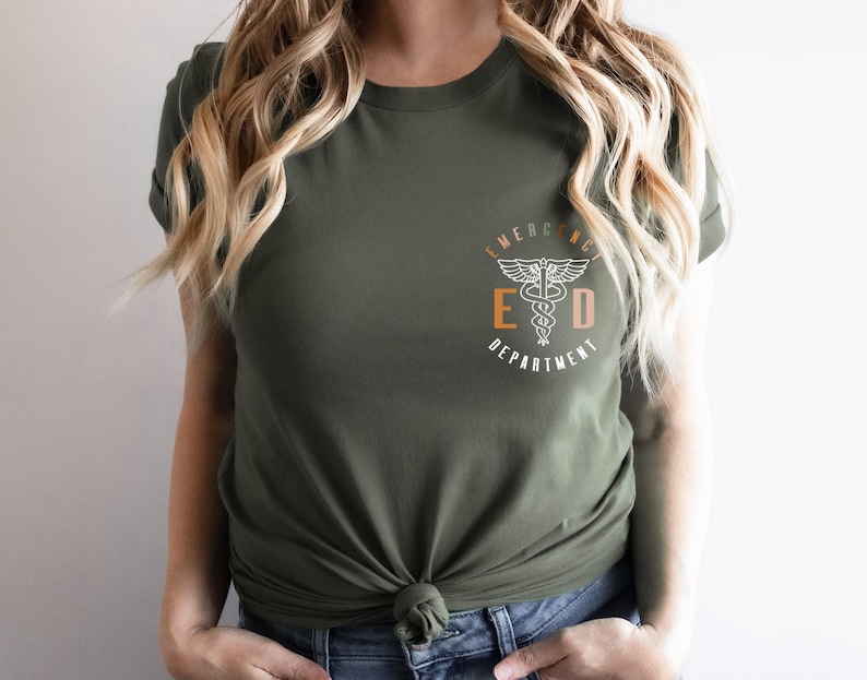 May include: A green t-shirt with a white graphic of a medical symbol and the text "Emergency Department" in a circle.