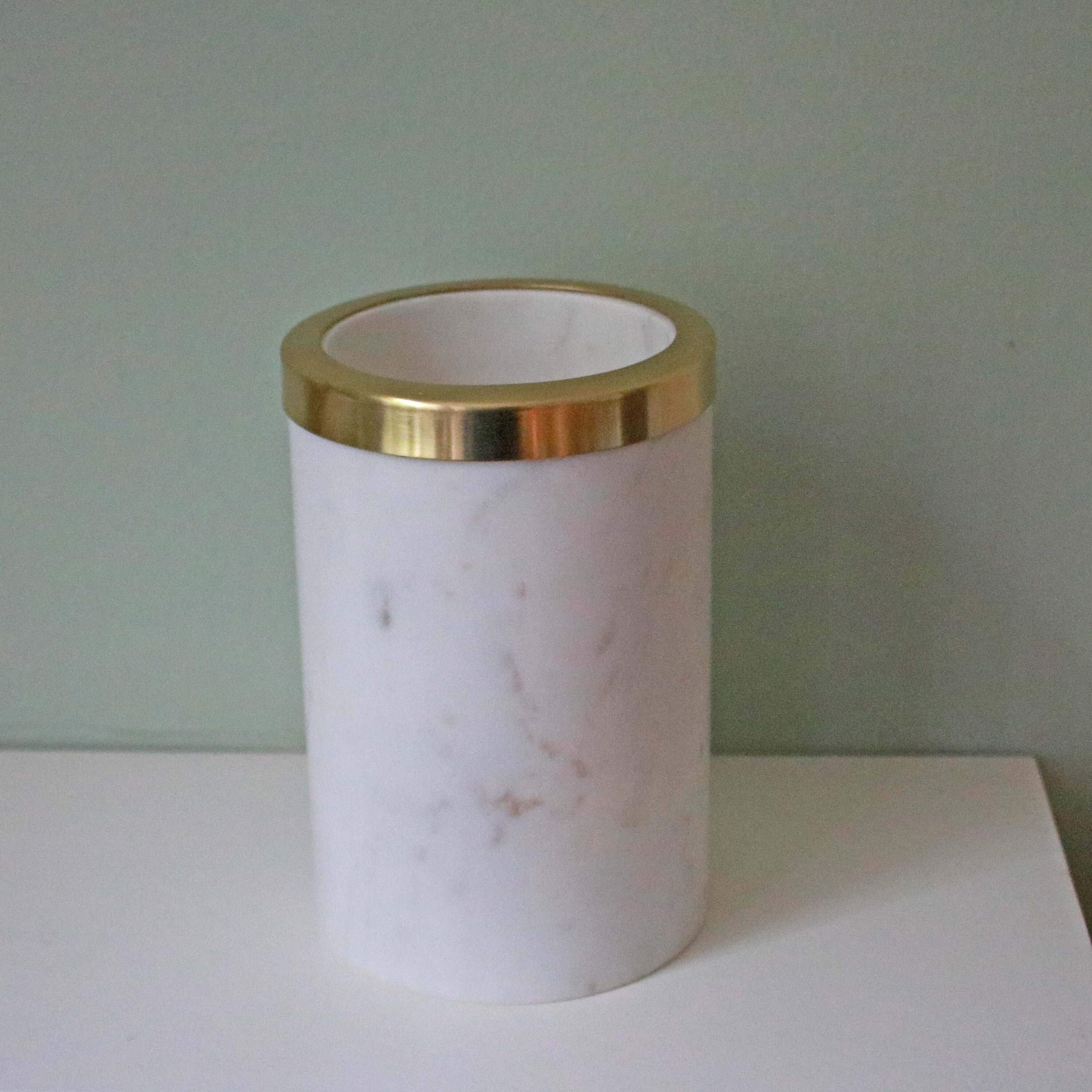 Stylish white marble utensil holder with brass rim. Etsy