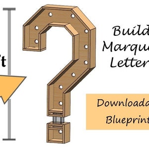 May include: A 3-foot tall wooden question mark marquee letter with light bulbs. The letter is made of wood and has a light brown finish. The letter is standing on a wooden base. The text "Build Marquee Letters" and "Downloadable Blueprints" is visible in the image.