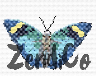 May include: A blue and green butterfly with yellow accents on its wings. The butterfly is embroidered on a white background.