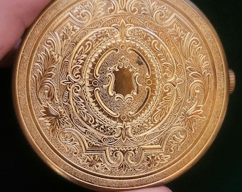 Estuche de maquillaje en polvo Elizabeth Arden vintage en tono dorado, fabricado en Suiza.