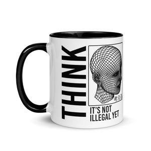 Op de afbeelding: Een witte keramische mok met een zwarte handgreep en binnenrand. De buitenkant is voorzien van de verticale tekst THINK, een draadmodelafbeelding van een menselijk hoofd in een rechthoekig kader en de tekst IT'S NOT ILLEGAL YET met Japanse karakters.
