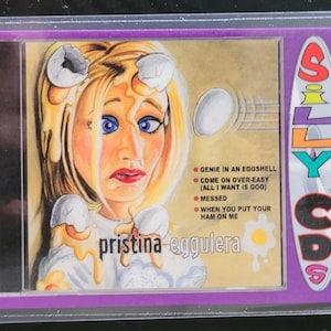 Christina Aguilera aka Pristina Eggulera (Genie in an Eggshell) 2001 Silly CD&#39;s card Refrigerator Magnet