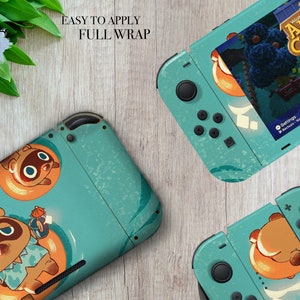 May include: A teal and orange Nintendo Switch console skin featuring Tom Nook from Animal Crossing. The skin has a tropical theme with palm leaves and waves. The skin is easy to apply and is a full wrap.