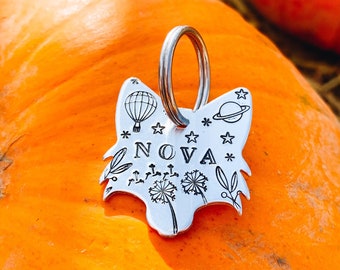 Fox-shaped aluminum medallion