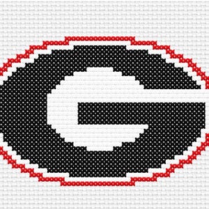 May include: Cross-stitch design featuring the University of Georgia Bulldogs logo. The logo is a black letter "G" inside a black oval, outlined in red, on a white background. The design is made with cross-stitch.