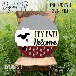 May include: A round welcome sign featuring a white sheep with a red star on its side. The sign has a red, white and grey colour scheme with the text "Hey Ewe! Welcome" in black lettering.