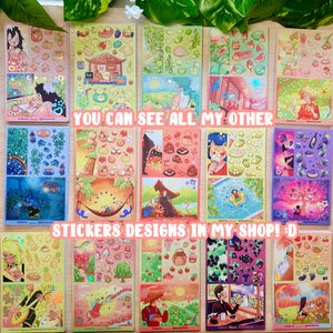 May include: A collection of colorful sticker sheets with various designs, including anime-style illustrations, food, and nature scenes. The text "YOU CAN SEE ALL MY OTHER STICKERS DESIGNS IN MY SHOP! :D" is visible. The stickers are arranged on a wooden surface.