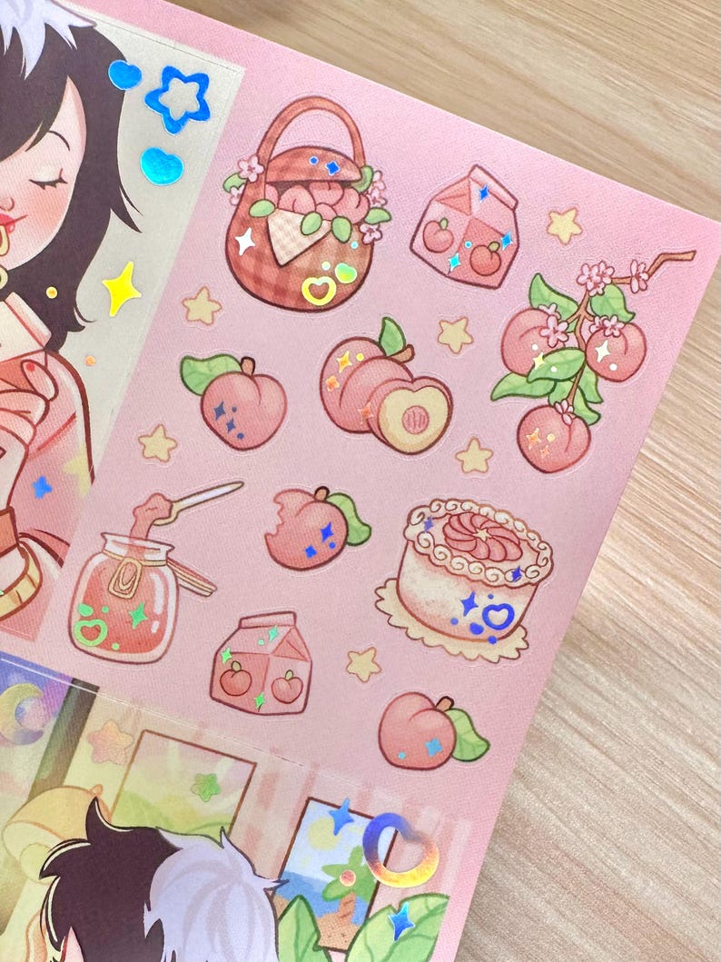 May include: A sheet of pink stickers featuring peach-themed illustrations. Designs include peaches, a picnic basket, a cake, and a jar of jam. The stickers have a cute, cartoonish style with holographic accents and star shapes.
