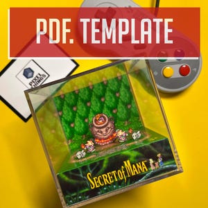 以下が含まれることがあります： ビデオゲーム「Secret of Mana」のシーンのジオラマを収めた透明なアクリルディスプレイ。ジオラマには、キャラクターと大きなポットのある詳細な風景が含まれています。レトロなグレーのコントローラーとテキスト「PDF. TEMPLATE」も表示されています。