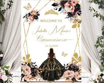 May include: Welcome to Isabella Maria's Quinceañera on 11.15.202X. A black and gold quinceañera welcome sign with floral accents and a gold crown.