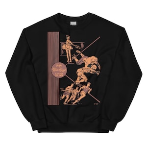 Puede incluir: Sudadera negra con una ilustración vintage de una mujer bailando, un jugador de fútbol americano y corredores. La ilustración está en tonos marrones y rosados. El texto "It's a West Coast Thing If You Know What I Mean" está en un círculo.