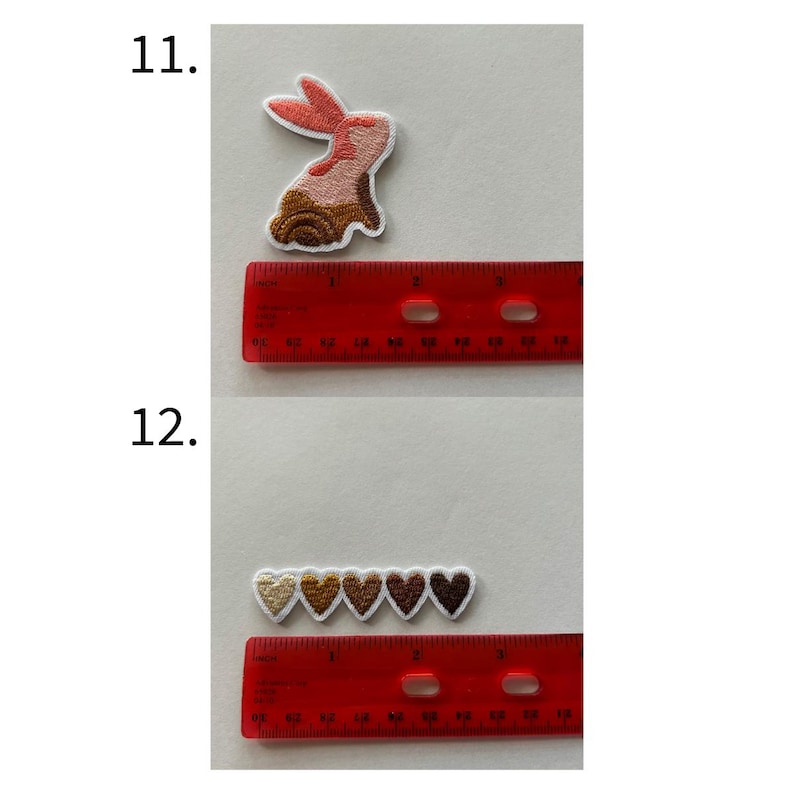 May include: Embroidered patches featuring a bunny and a row of hearts. The bunny patch is pink, brown, and white. The hearts are in shades of brown. A red ruler is included for size reference. These patches are ideal for clothing or craft projects.