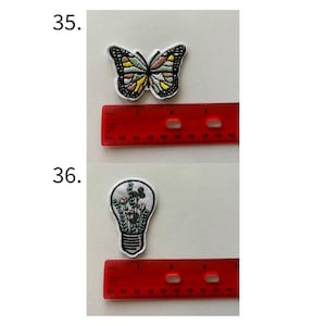 May include: Two embroidered patches: a butterfly with black, yellow, and pink details, and a lightbulb filled with flowers. The butterfly patch is approximately 2 inches wide. The lightbulb patch is approximately 1.5 inches wide. Both patches have a white border.