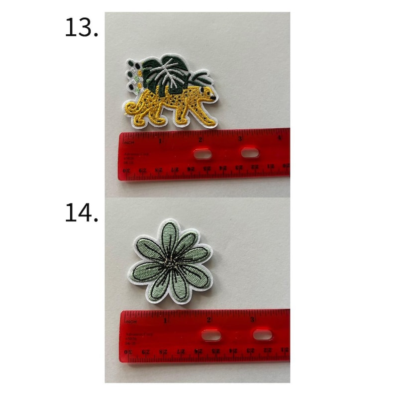 May include: Two embroidered patches: a yellow leopard with green leaves and a green flower. The leopard patch is approximately 2 inches long. The flower patch is approximately 1.5 inches in diameter. Both patches have white borders.