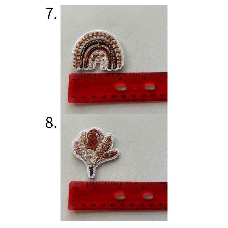 May include: Embroidered patches featuring a rainbow and a flower. The rainbow patch is in shades of brown and beige, approximately 2 inches wide. The flower patch is in shades of pink and brown, approximately 2 inches tall. Both patches have white borders.