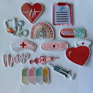 May include: A collection of embroidered patches with medical themes. Designs include a stethoscope, a heartbeat, a rainbow, a nurse's cap, a bandage, a syringe, pills, and the word "Nurse". The patches are in various colors, including red, pink, and blue.