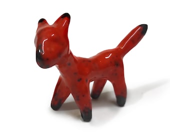 A long-legged red cat stands on 4 legs, the tail is raised up - ceramic figurine covered with glaze, majolica, gift for red cat lover