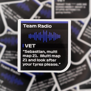 May include: A black and white sticker with blue accents. The sticker says "Team Radio" and features a blue sound wave graphic. The text below the graphic says "IVET" and includes a message from the team radio: "Sebastian, multi map 21. Multi map 21 and look after your tyres please."