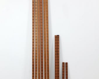 Rieles de pared para el sistema Cado de Poul Cadovius | Sistema de estanterías | Diseño danés | Mediados de siglo | Años 60 | Teca