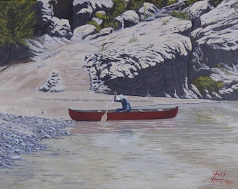May include: A red canoe with a person paddling in a river surrounded by rocky cliffs. The water is calm and the sky is clear.