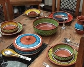 Fiesta Range Of Kitchen Ceramics. Bold, colourful fun. Hand painted. Mix and match items to create an extravagant table for any occasion.