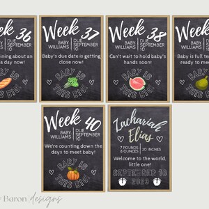 May include: A set of nine chalkboard signs with a weekly pregnancy tracker. Each sign features a different food item and the text "Baby is this big!" The final sign announces the birth of Zachariah Elias, born on September 10, 2023, weighing 7 pounds and 8 ounces and measuring 20 inches.