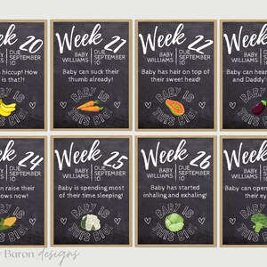 May include: A set of ten chalkboard-style cards with a weekly pregnancy tracker. Each card features a different week of pregnancy, from week 20 to week 27, with a corresponding baby milestone and a fruit or vegetable illustration. The text on the cards reads "Baby Williams due September 10".