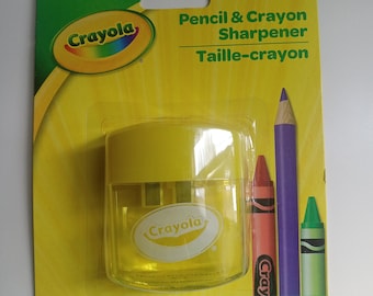 Crayola crayon and colored pencil sharpener in yellow. New.
