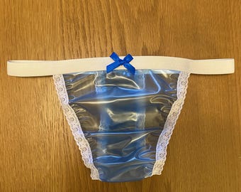 May include: Light blue transparent underwear with white lace trim and a blue bow at the center.