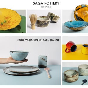 May include: Assortment of handmade pottery bowls, plates, and mugs in various colors and styles. The pottery is made in Ukraine. The text "SAGA POTTERY UKRAINE" and "HUGE VARIATION OF ASSORTMENT" is visible in the image.