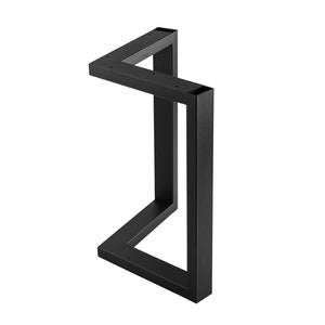 May include: Black metal table leg with a unique angled design. The leg is made of sturdy metal and has a black finish.