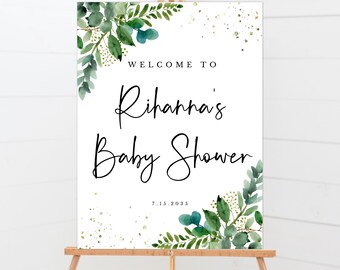 May include: Welcome to Rihanna's Baby Shower sign with green watercolor leaves and gold glitter. The date of the event is 7.15.2035.