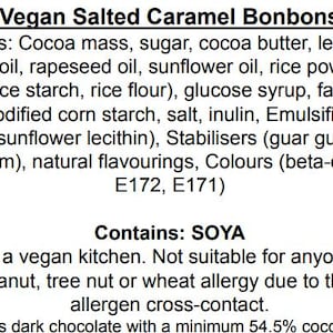 May include: A product label for Vegan Salted Caramel Bonbons listing ingredients including cocoa mass, sugar, cocoa butter, lentil protein, coconut oil, rapeseed oil, sunflower oil, rice powder, glucose syrup, faba bean, vanilla, starch, salt, and soya.