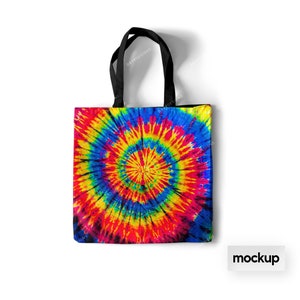 May include: A black tote bag with a colorful tie-dye pattern. The pattern features a large, swirling circle of red, yellow, blue, and green.