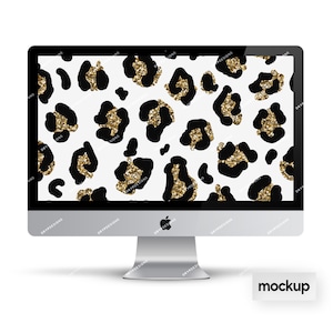 May include: A computer screen displaying a digital wallpaper with a black and white leopard print pattern with gold glitter accents. The computer is a silver iMac with a white background.