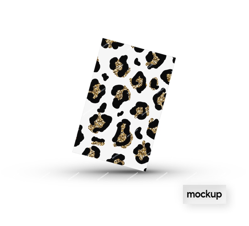May include: A white background with a black and gold leopard print pattern. The print is made up of black leopard spots with gold glitter accents.