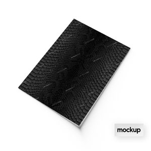 May include: Black snakeskin textured sheet of vinyl. The vinyl is flat and has a smooth surface.