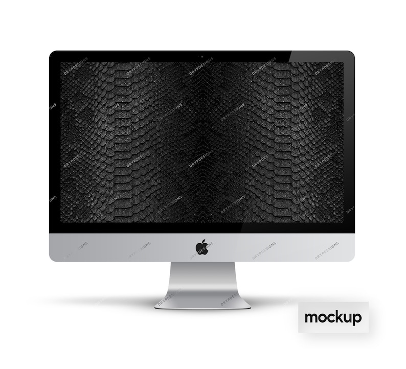May include: A silver desktop computer with a black screen displaying a snake skin pattern. The computer is on a white surface with the word "mockup" printed below it.