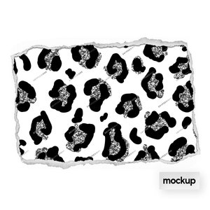 May include: A white background with a black and silver glitter leopard print pattern. The pattern is repeated throughout the image. The edges of the image are torn, giving it a distressed look.
