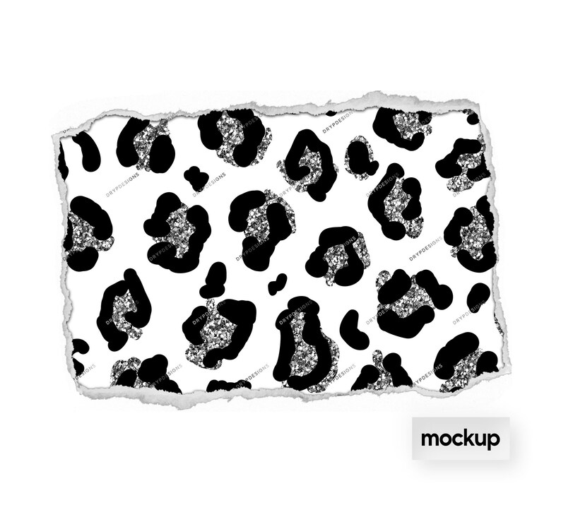 May include: A white background with a black and silver glitter leopard print pattern. The pattern is repeated throughout the image. The edges of the image are torn, giving it a distressed look.