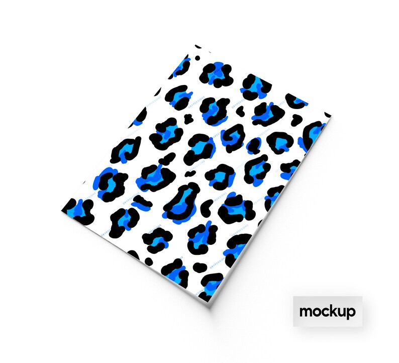 May include: A white background with a blue and black leopard print pattern. The print is a repeating pattern of blue leopard spots on a white background.