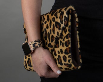 black bolsa with leopard print strap