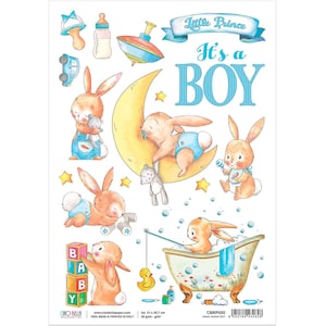 May include: A sheet of paper with a blue and white banner that says "Little Prince It's a Boy". The sheet is decorated with illustrations of bunnies, stars, a moon, and baby toys. The paper is 21 x 29.7 cm and 28 gsm.