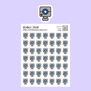 May include: A sticker sheet featuring forty-nine individual die-cut stickers of a gray webcam with a blue lens and a small red light. The top of the sheet displays the text Sticker Peep, the URL https://stickerpeep.etsy.com, and a QR code.