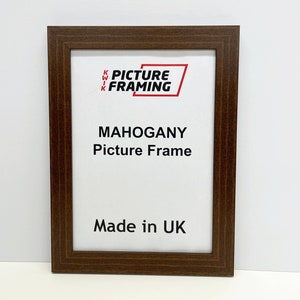 May include: A mahogany picture frame with the text "KWIK PICTURE FRAMING" and "MAHOGANY Picture Frame" and "Made in UK".