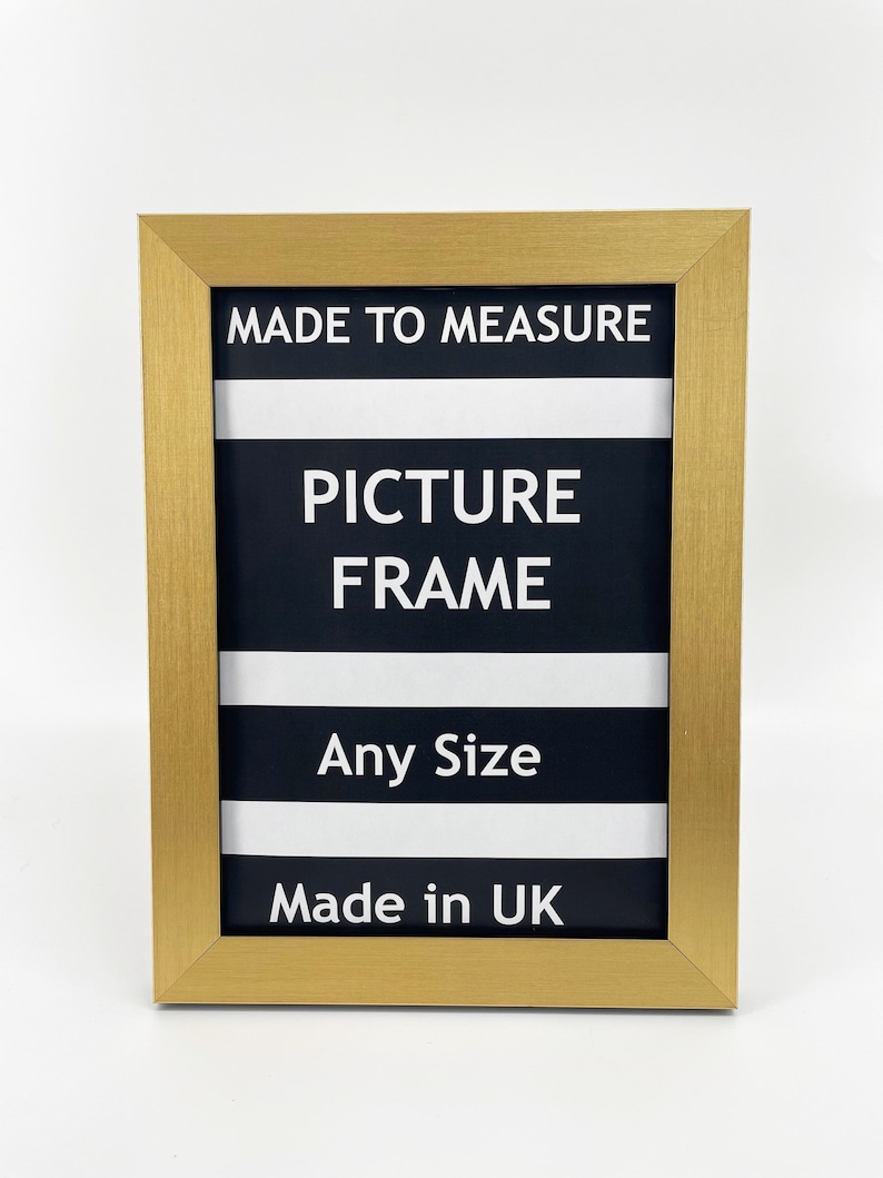 May include: Gold picture frame with black and white stripes and the text "Made to Measure Picture Frame Any Size Made in UK".