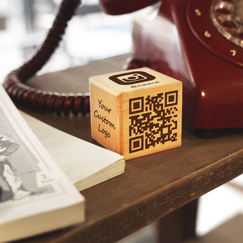 a wooden block that has a qr code on it