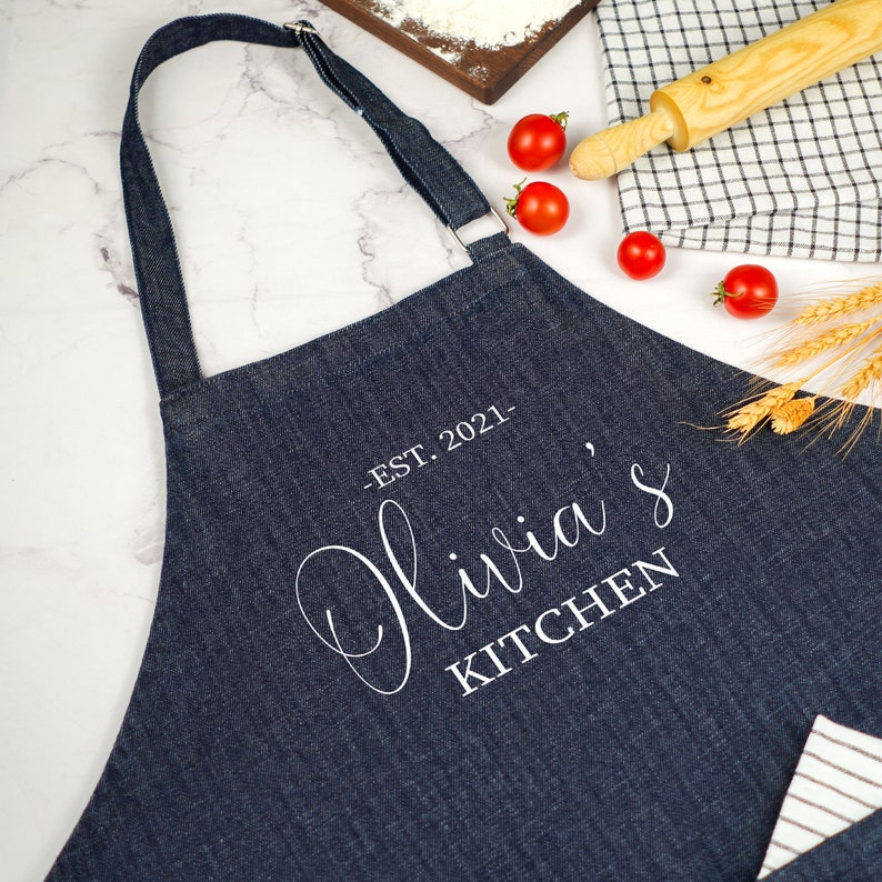 a kitchen apron with a name on it